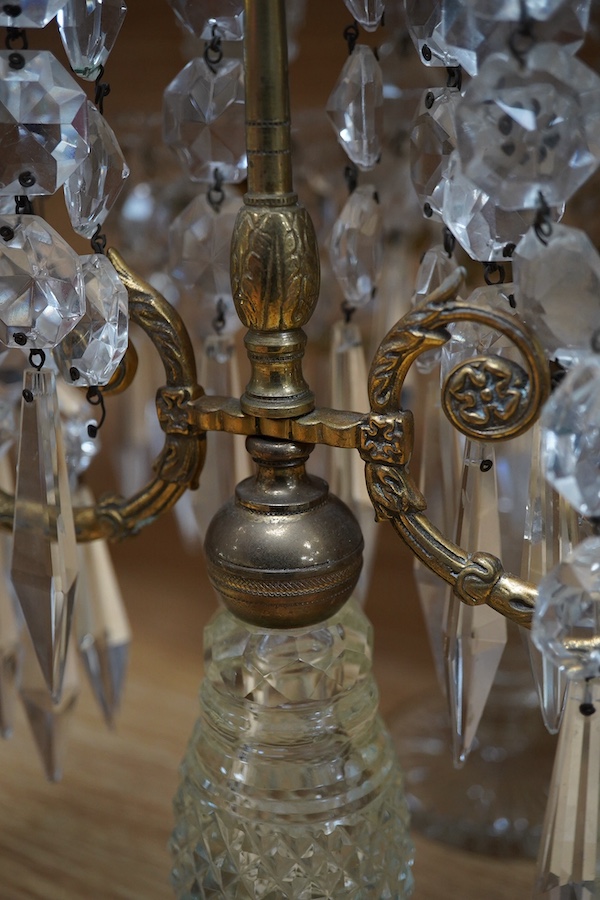 A pair of 19th century cut glass lustre drop candelabra, 42cm high. Condition - fair to good